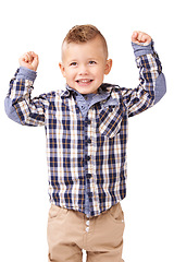 Image showing Child, arms and strong confidence or flexing for future muscle development, white background or studio. Boy, kid and model as mockup space for bicep growth for brave power for health, pride or cool