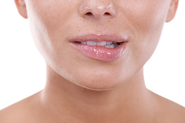 Image showing Woman, flirting and biting lips closeup in white background, mock up and studio with beauty. Model, gesture and nervous body language or excited person with teeth on skin of mouth in backdrop