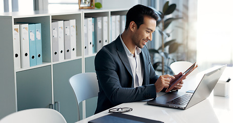 Image showing Happy business man, laptop and tablet for data analytics, stock market and online research for profit, sales or company account. Asian trader, investor or analyst in office on digital tech and comput