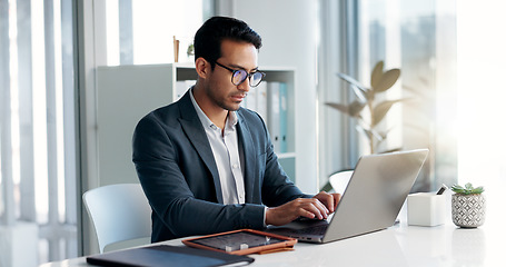 Image showing Data analysis, research and businessman with a tablet and laptop for accounting or economy growth. Office, Asian and financial worker with technology for email, planning or information on a website