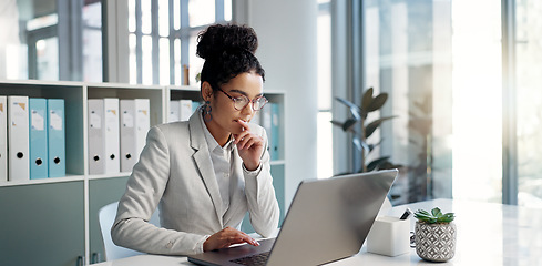 Image showing Thinking, laptop and typing business woman, bank consultant or working on research report, project or solution. Computer, administration analysis and professional person reading online account data