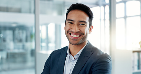 Image showing Asian business man, arms crossed and face in office, smile and pride for leadership, management and professional. Financial advisor, businessman and happy in portrait, suit and ambition in workplace