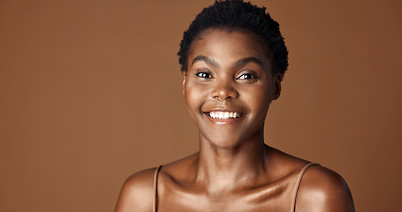 Image showing Face of black woman, natural beauty or aesthetic for wellness, cosmetics or healthy skin in studio. Dermatology, pride or serious African girl model with glow or skincare results on brown background