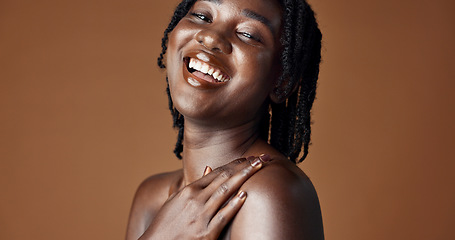 Image showing Face, beauty and skincare with happy black woman in studio isolated on brown background for wellness. Portrait, aesthetic and smile for foundation cosmetics or dermatology with a natural young person