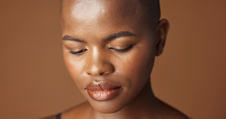 Image showing Face, skincare and aesthetic with happy black woman in studio isolated on brown background for wellness. Portrait, beauty and smile for foundation cosmetics or dermatology with a natural bald person