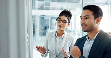 Image showing Business people, planning and glass wall with point, talk and thinking with notes for problem solving. Partnership, man and woman with brainstorming, leadership and moodboard with choice for solution