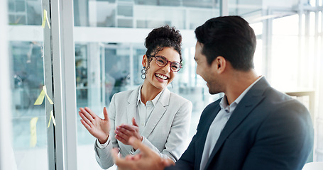 Image showing Business people, celebrate and planning by glass, office and success with thinking, notes or problem solving. Corporate partnership, brainstorming and celebration with moodboard, decision and goals