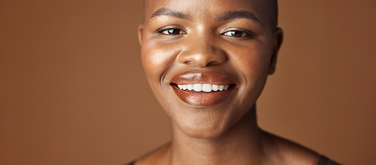 Image showing Face, skincare and smile with happy black woman in studio isolated on brown background for wellness. Portrait, beauty and aesthetic for foundation cosmetics or dermatology with a natural young person