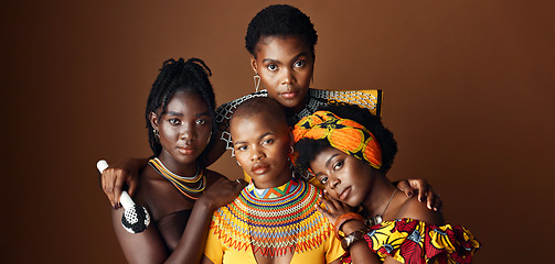 Image showing African women, group and studio for culture with face, jewelry or beads necklace in clothes by background. Black people, model and indigenous fashion for friends, traditional or portrait for kwanzaa