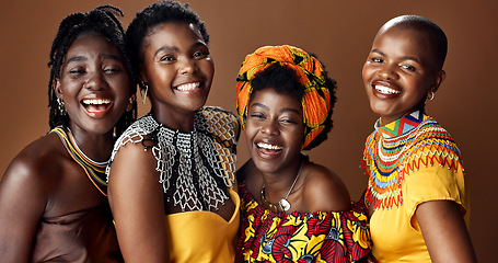 Image showing Traditional African women, group and studio for face, jewelry or beads necklace in clothes by brown background. Black people, model and indigenous fashion for friends, culture or portrait for kwanzaa