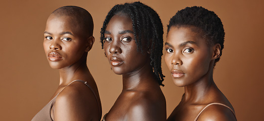 Image showing Beauty, face or black women models with glowing skin or afro isolated on brown background. Facial dermatology, diversity or skincare cosmetics for makeup in studio with girl friends or African people