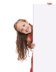 Image showing Child, portrait and placard board in studio or announcement information, billboard or white background. Female person, girl and mockup space or news poster or bulletin review opinion, sign or message