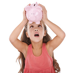 Image showing Girl, child and shock for piggy bank in studio, inflation and financial planning on white background. Female person, investment risk and loan for future, moneybox and insurance for bankruptcy in jar