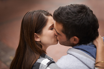 Image showing Love, city and face of couple kiss, bonding together and enjoy outdoor date with care, support and partner commitment. Devotion, relationship connection and romantic people in sweet intimate moment