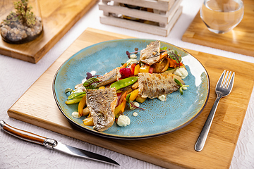 Image showing Grilled fish fillet with vegetables