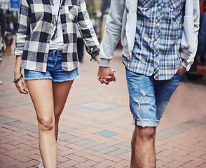 Image showing Urban journey, walk or couple holding hands, relax and travel for morning wellness, outdoor trip and explore city. Casual clothes, fashion apparel or romantic people commute with care, love and trust