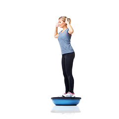 Image showing Woman, ball and standing in balance for fitness or exercise on a white studio background. Young active female person or athlete on half round object in training, health and wellness on mockup space