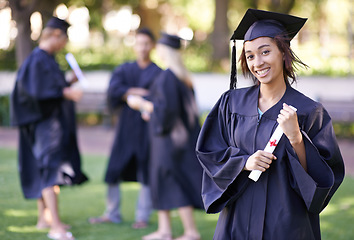 Image showing Happy woman, portrait and student with certificate in graduation for education, learning or qualification. Young female person or graduate smile for scholarship, diploma or degree at outdoor ceremony