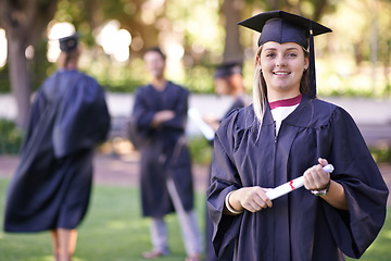 Image showing Happy woman, portrait and student with qualification in graduation for education, learning or success. Female person or graduate smile for higher certificate, diploma or degree at outdoor ceremony