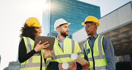 Image showing People, architect and team walking with tablet in planning for construction, building or project in city. Group of employees, contractor or engineer in teamwork with technology for architecture plan