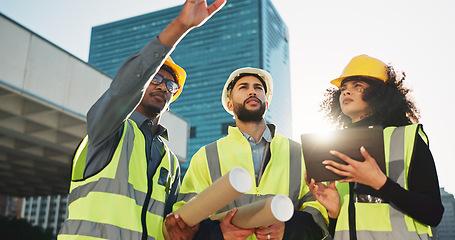 Image showing People, architect and team with tablet in city planning for construction, building or project. Group of employees, contractor or engineer in teamwork with technology for architecture plan on site