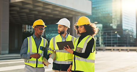Image showing People, architect and team walking with tablet in planning for construction, building or project in city. Group of employees, contractor or engineer in teamwork with technology for architecture plan