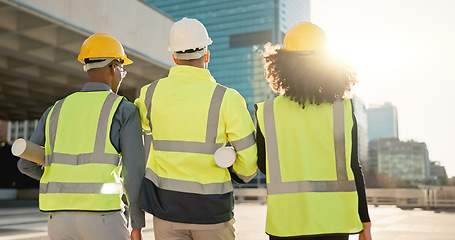 Image showing People, back and architect team walking in city for construction, maintenance or building on site. Rear view of employee group, engineer or contractor in teamwork for architecture project or plan