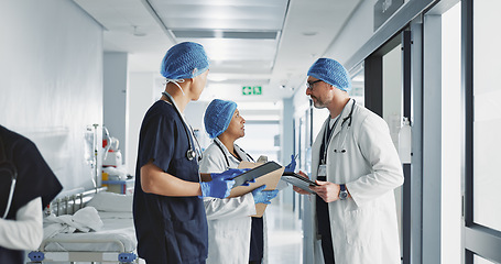 Image showing Healthcare, talking and doctors with a tablet at a hospital for health advice or surgery communication. Help, clinic and medical employees speaking with technology, planning and schedule for nursing