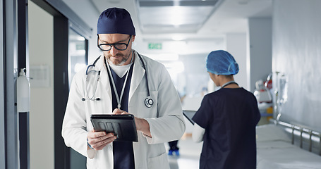 Image showing Surgeon, doctor and tablet for hospital, healthcare or clinic research, online planning and schedule management. Medical professional typing on digital technology for surgery results, charts or data