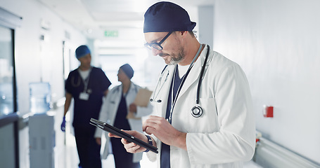 Image showing Man, doctor and tablet for hospital, healthcare or clinic research, online planning and schedule management. Medical professional or surgeon typing on digital technology for surgery results or data