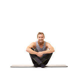 Image showing Man, fitness or happy portrait on floor in studio for healthy body, muscle or training isolated on white background. Wellness, workout or strong model smile on mat for exercise, power or mockup space