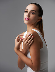 Image showing Woman, portrait and manicure with pink lipstick for beauty, rainbow nail polish and cosmetics on grey background. Cosmetology, lips and color nails with makeup, confidence and glamour in studio