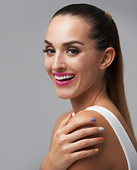 Image showing Happy woman, manicure for beauty and makeup, face of model for cosmetics and nail polish isolated on grey background. Smile in portrait, rainbow color nails and glamour, confident and skin in studio