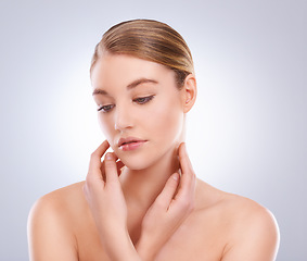Image showing Thinking, skincare and woman with beauty, cosmetics and dermatology on white studio background. Person, girl and model with wellness or grooming with makeup, treatment and self care with healthy skin