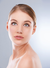 Image showing Thinking, skincare and woman with makeup, dermatology and wellness on a white studio background. Person, glow and model with beauty and grooming with cosmetics, shine and self care with healthy skin