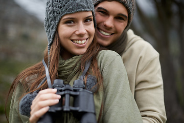 Image showing Portrait, binocular and happy couple hiking on nature journey, travel adventure or forest jungle. Marriage, love and face of people smile for outdoor trekking, bird watching or camping trip in woods