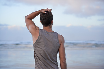 Image showing Back, beach and man with vacation, travel and journey with tropical island getaway and adventure. Person, ocean and guy with summer break and seaside with holiday, water and wellness with freedom