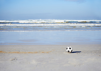 Image showing Soccer ball, sport and games for holiday at beach, outdoor fun and recreation in summer on vacation. Celebrate, playing or leisure on travel by sea, freedom or football competition in brazil by ocean