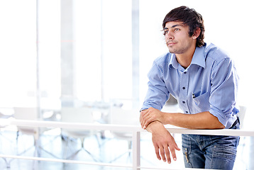 Image showing Man, railing and thinking of career in workplace and wellness with job growth as it professional. Young person, thought and vision for entrepreneurship, geek and tech start up idea for silicon valley