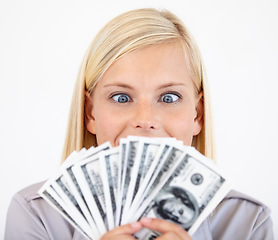 Image showing Excited, silly woman and money with dollars, investment and savings for budget with reward. Wealth, wondering and happy person with cash profit from work bonus in studio with white background