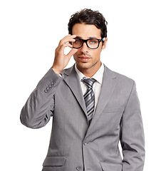 Image showing Business, man and adjusting glasses or thinking in suit with fashion, style or vision of future in white background. Serious, businessman and entrepreneur with insight, ideas and eyewear in studio