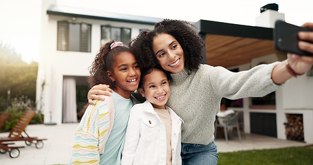 Image showing Family, selfie and children outdoor with a smile, love and care in home backyard. Face of young latino woman, woman or parent for a picture with happy kids for social media post or profile picture