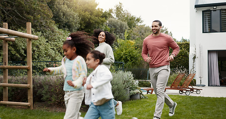 Image showing Family, running and children outdoor in backyard for playing, happiness and bonding at home. Young latino woman, man and happy kids at a playground while on holiday or vacation for a fun activity