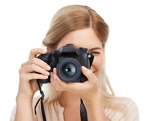 Image showing Photographer, camera and focus with woman and lens, take picture for art and photo journalist on white background. Press, creativity and photography in studio for content creation with technology