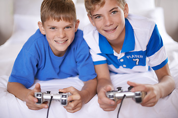 Image showing Children, happy and portrait of video game in home, love and excited for online gaming in bedroom. Young brothers, smile and face for streaming sports on bed, bonding and relax together on weekend