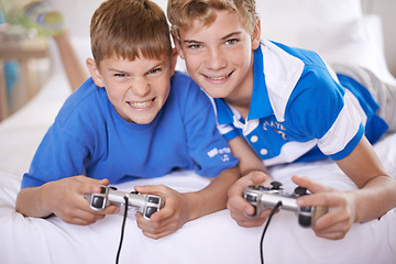 Image showing Children, excited and portrait of video game in home, love and happy for online gaming in bedroom. Young brothers, smile and face for streaming sports on bed, bonding and relax together on weekend