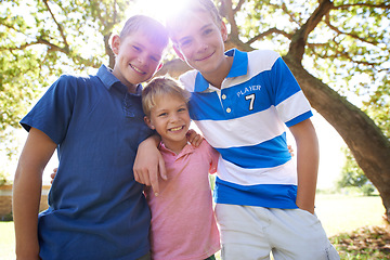 Image showing Friends, brothers and embracing in nature portrait, children and care in childhood or smiling. Happy siblings, hug and satisfaction on outdoors adventure, love and having fun on vacation or holiday