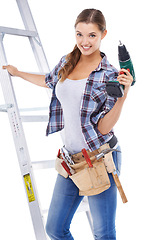 Image showing Woman, portrait and ladder or drill in studio or contractor for building, maintenance or power tools. Female person, face and process on white background for remodel improvement, project or mockup