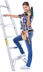 Image showing Woman, portrait and ladder or drill as construction worker or handyman for building, maintenance or power tools. Female person, face and studio on white background for improvement, project or mockup