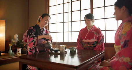 Image showing Japanese, women and matcha for tea ceremony in Chashitsu with kimono dress and traditional custom. People, temae and vintage style outfit for culture, fashion and honor with antique crockery